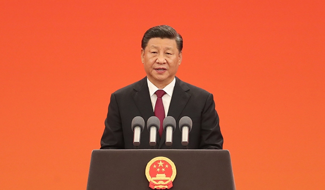 习近平向国家勋章和国家荣誉称号获得者颁授勋章奖章并发表重要讲话